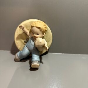 Adorable Figurine with Teddy Bear